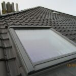 Velux sur nouvelle toiture en tuiles de terre cuite